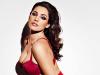 Hot pink ... Kelly Brook shows off her enviable curves
