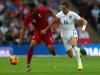 Hands on: Jordan Henderson grappled with Andre Carrillo