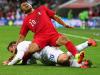 Capital clash: Wayne Rooney brought Peru midfielder Luis Ramirez crashing down