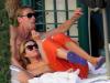 SETTING TONGUES A WAG-GING: The couple enjoyed a steamy smoochHOLIDAY ROMANCE: The pair looked as in love as ever