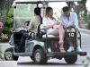 Grealish seen with long-term girlfriend Sasha on a golf buggy Credit: Splash