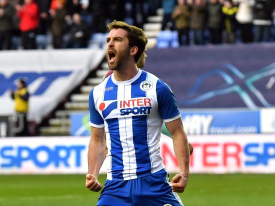 Will Grigg and Nick Powell secure victory for leaders Wigan