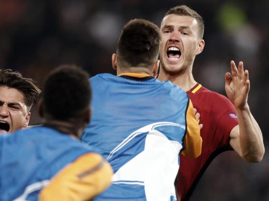 Dzeko strike sees Roma through on away goals