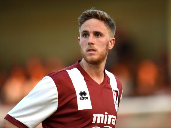 Barrow hold on for vital victory