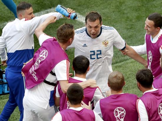 Russia reach last eight thanks to penalty shoot-out win over sorry Spain