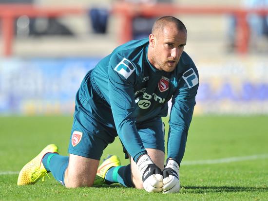 Morecambe goalkeeper Barry Roche banned for Oldham clash