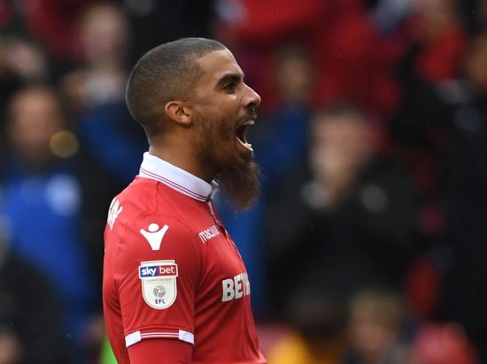 Lewis Grabban recovers from spot-kick miss to fire double