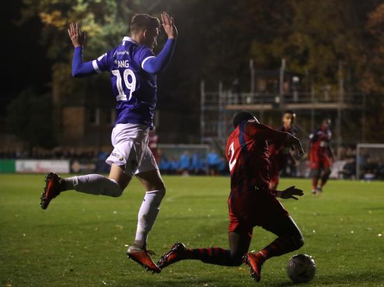 Oldham score two late goals to avoid FA Cup shock at Hampton & Richmond