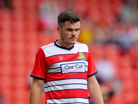 Returning Rowe nets late winner for Doncaster to rock Wimbledon
