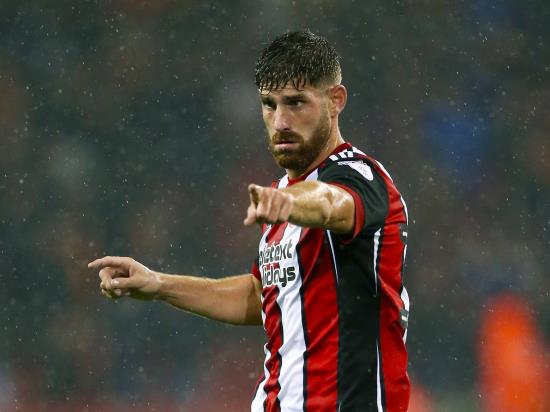 Ched Evans guides Fleetwood to comfortable win at AFC Wimbledon
