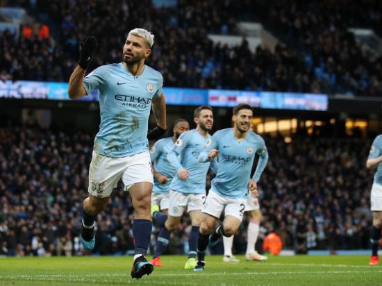 Aguero treble sinks Arsenal and gets City back in title hunt