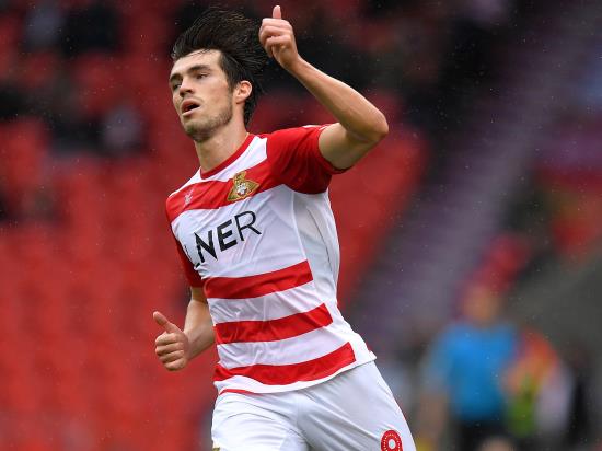 Doncaster hit back to sink 10-man Peterborough