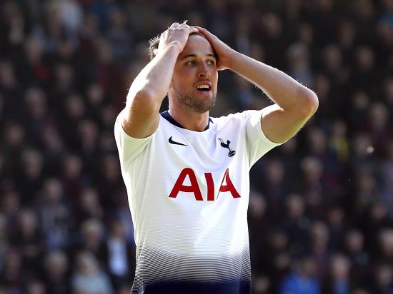 Kane returns with a goal for Spurs but title hopes blow up at Burnley