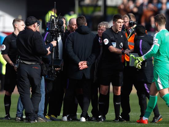 Pochettino blames disappointment of defeat for heated referee exchange