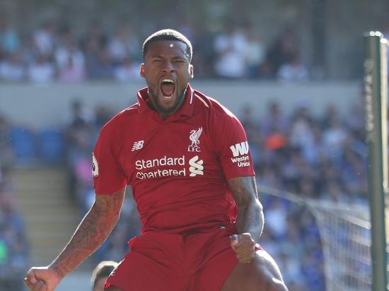 Liverpool return to top spot with victory at Cardiff