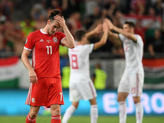 Wales made to pay for Bale miss as Hungary snatch late win