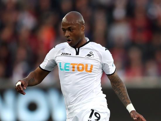 Andre Ayew brace sends Swansea into round two
