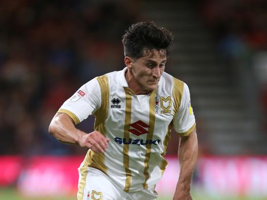 Lincoln’s unbeaten start ended by MK Dons