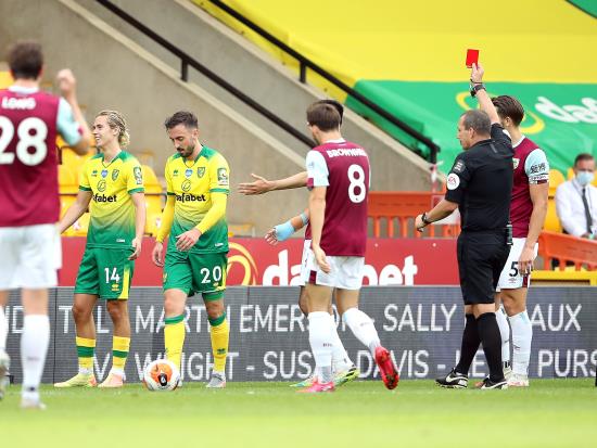 Burnley cruise past nine-man Norwich to keep European hopes alive