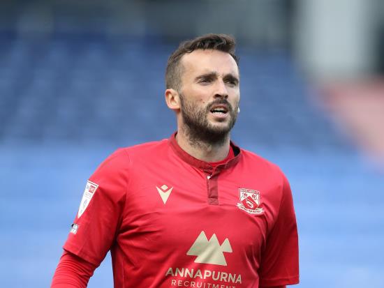 Morecambe go top of table after victory at Oldham