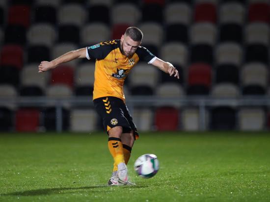 Newport stay top as late Brandon Cooper goal sees off 10-man Harrogate