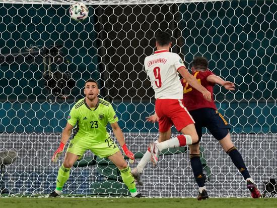 Robert Lewandowski earns Poland point as profligate Spain pay the penalty
