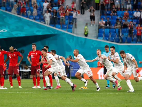 Spain sneak into semi-finals with shootout success over Switzerland