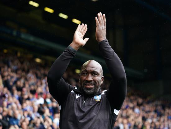Darren Moore stands by his man after late error costs Owls victory at Ipswich