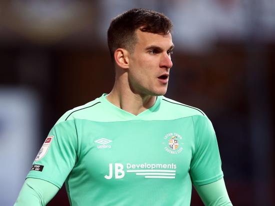 Luton goalkeeper Simon Sluga could miss clash with Cottagers