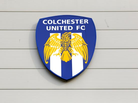 Emyr Huws scores last-gasp goal as nine-man Colchester hold Swindon