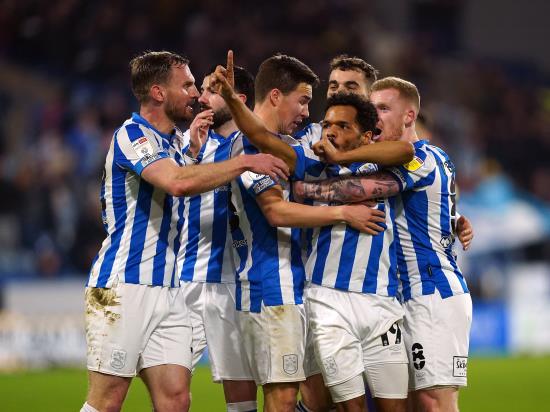 Huddersfield finally break down 10-man Derby to move into play-off spots