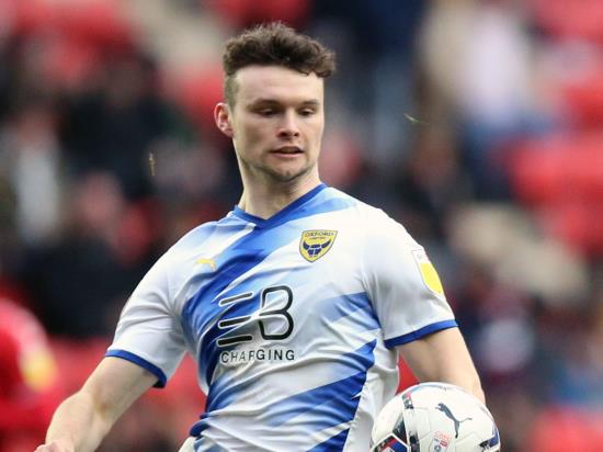 Luke McNally scores stoppage-time equaliser as Oxford deny Ipswich victory