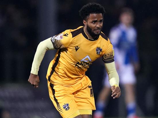 Ricky Korboa at the double for Sutton in Oldham win
