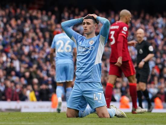 Manchester City retain slender lead after thrilling draw with rivals Liverpool