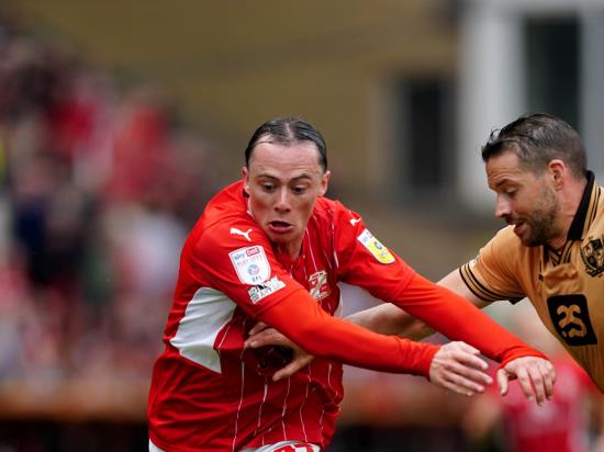 Harry McKirdy brace boosts Swindon prospects in play-off showdown with Port Vale