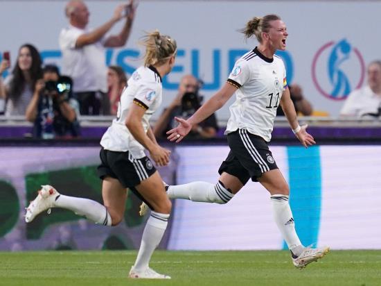 Germany ease to win over Spain to qualify as group winners