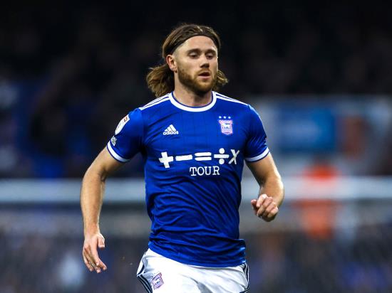 Ipswich brush aside MK Dons to go top of League One