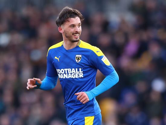 AFC Wimbledon return to winning ways with comfortable victory at 10-man Crawley