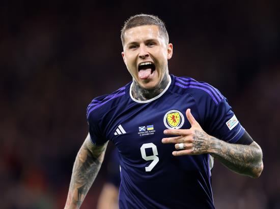 Substitute Lyndon Dykes heads in late double as Scotland beat Ukraine