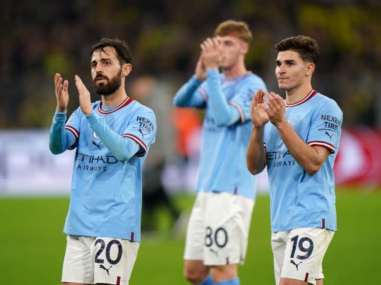 Pep Guardiola satisfied as tired Man City wrap up top spot with draw in Dortmund