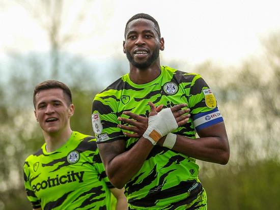 Forest Green striker Jamille Matt holds up Oxford