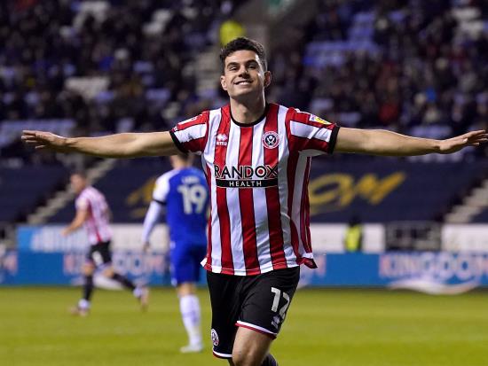 Sheffield United beat Wigan to cement second-place spot in the Championship