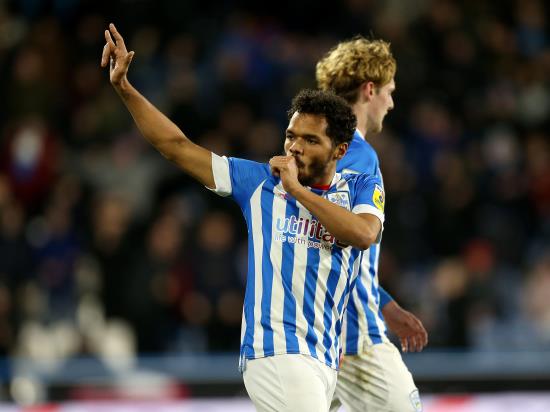 Huddersfield improve survival hopes with defeat over fellow strugglers Rotherham