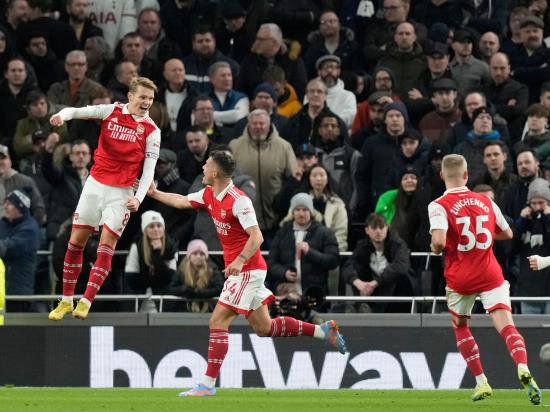 Arsenal extend Premier League lead to eight points with win at Tottenham