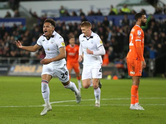 Swansea battle to victory over 10-man Blackpool