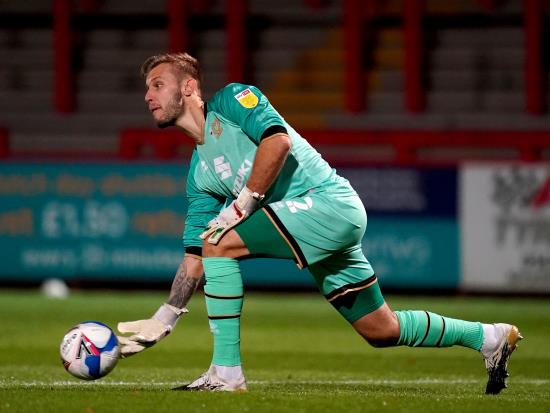 Laurie Walker stars with two penalty saves as Barnet draw with Woking