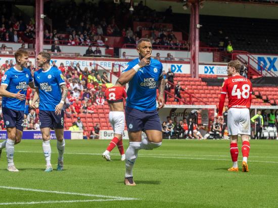 Peterborough book play-off place with victory at Barnsley