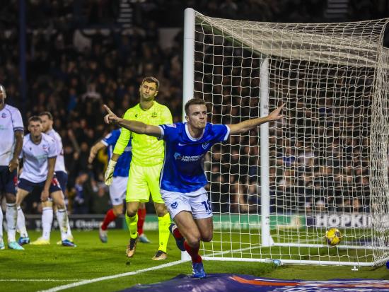 Portsmouth beat Bolton to go six points clear at League One summit