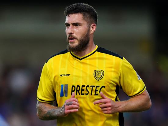 Managerless Burton salvage point at Charlton with last-gasp Ryan Sweeney goal