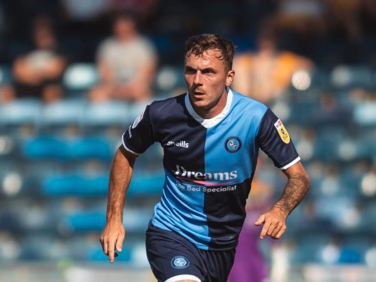 Ten-man Wycombe survive late Bristol Rovers fightback